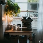 Kitchen with white cabinets and wooden floor
