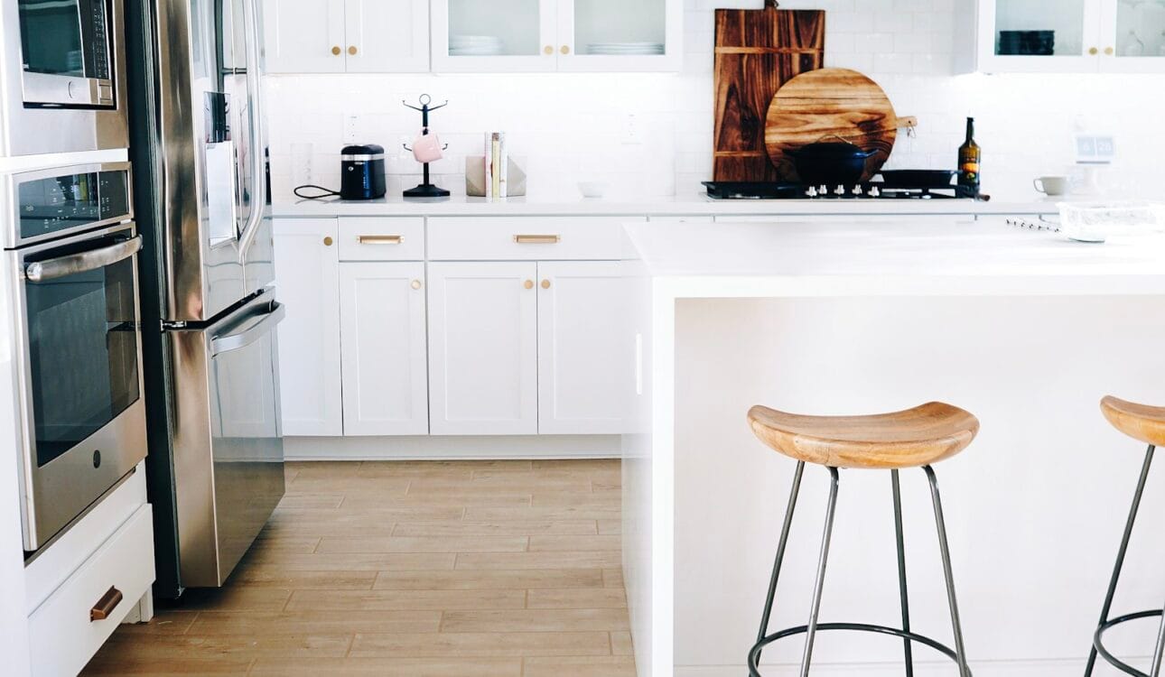 Kitchen with base cabinets, wall cabinets and tall units