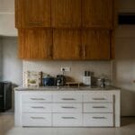Clean modern kitchen cabinets and worktop