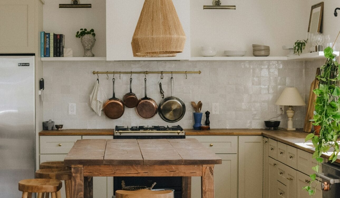 Modern kitchen with a large central island and pendant lights
