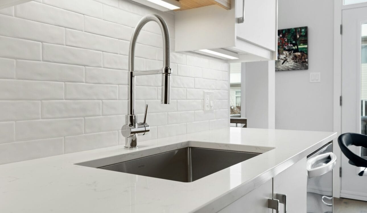 Modern kitchen sink with chrome tap