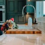 Kitchen with a marble-look worktop and modern cabinets