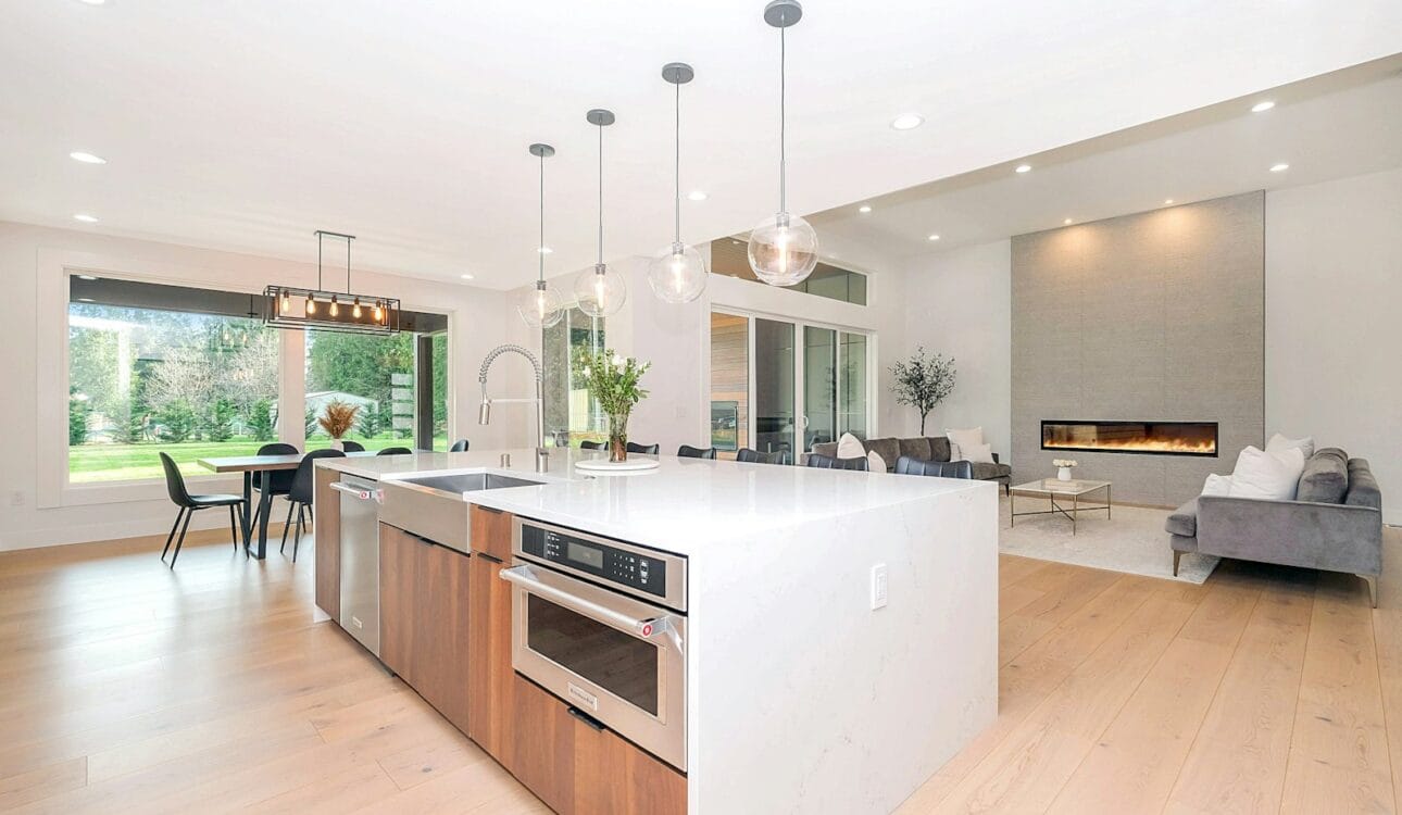 Open-plan kitchen connected to a living and dining area